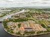Drone image of Teesdale Business Park showing buildings along the river and Infinity Bridge
